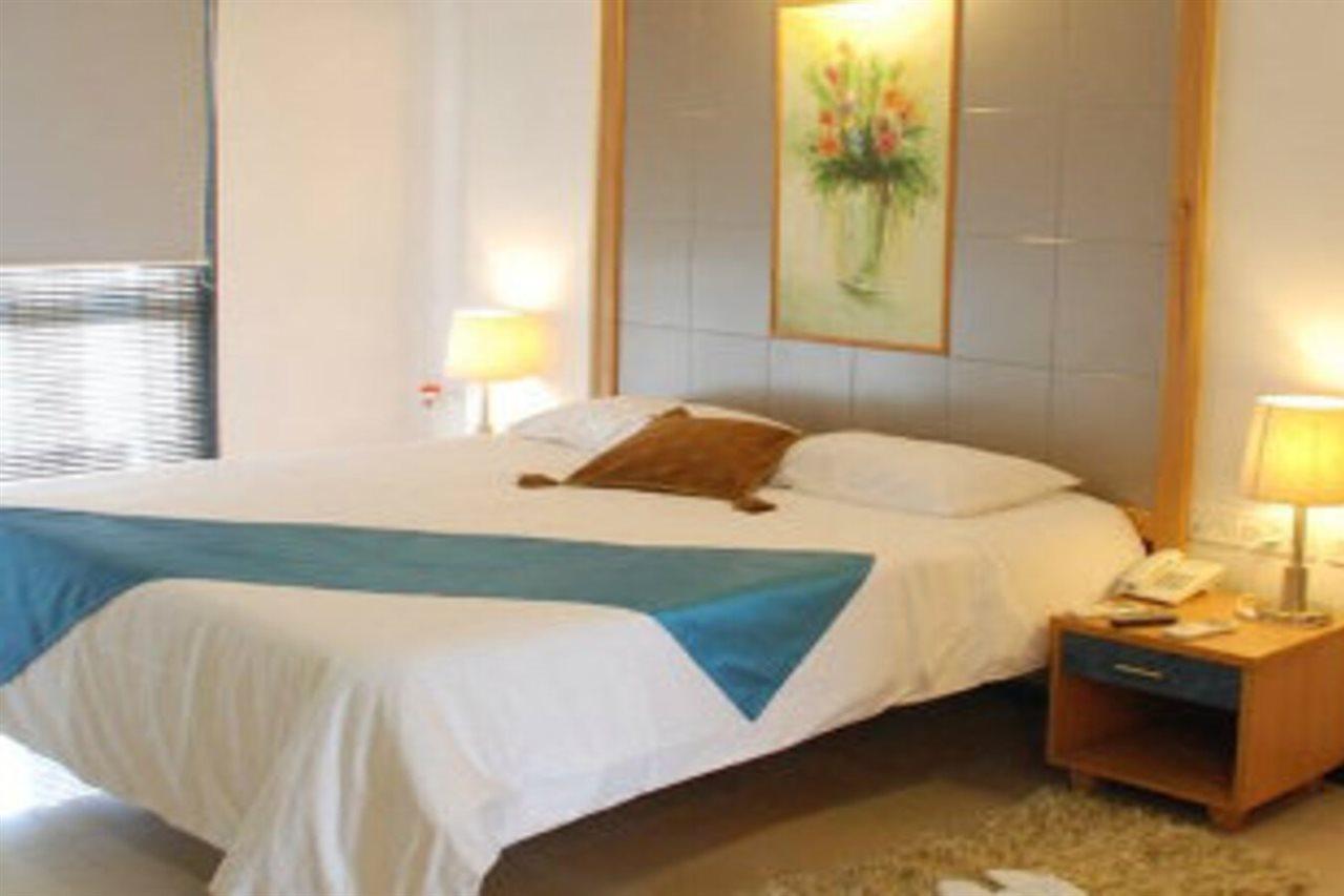 Treebo Edha Suites Koramangala Бангалор Экстерьер фото