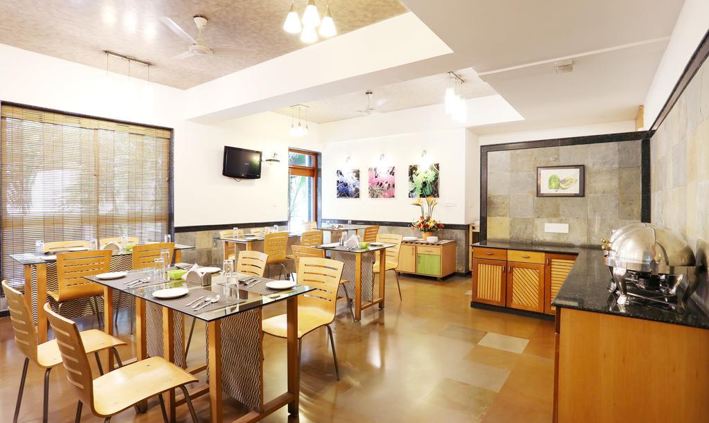 Treebo Edha Suites Koramangala Бангалор Экстерьер фото