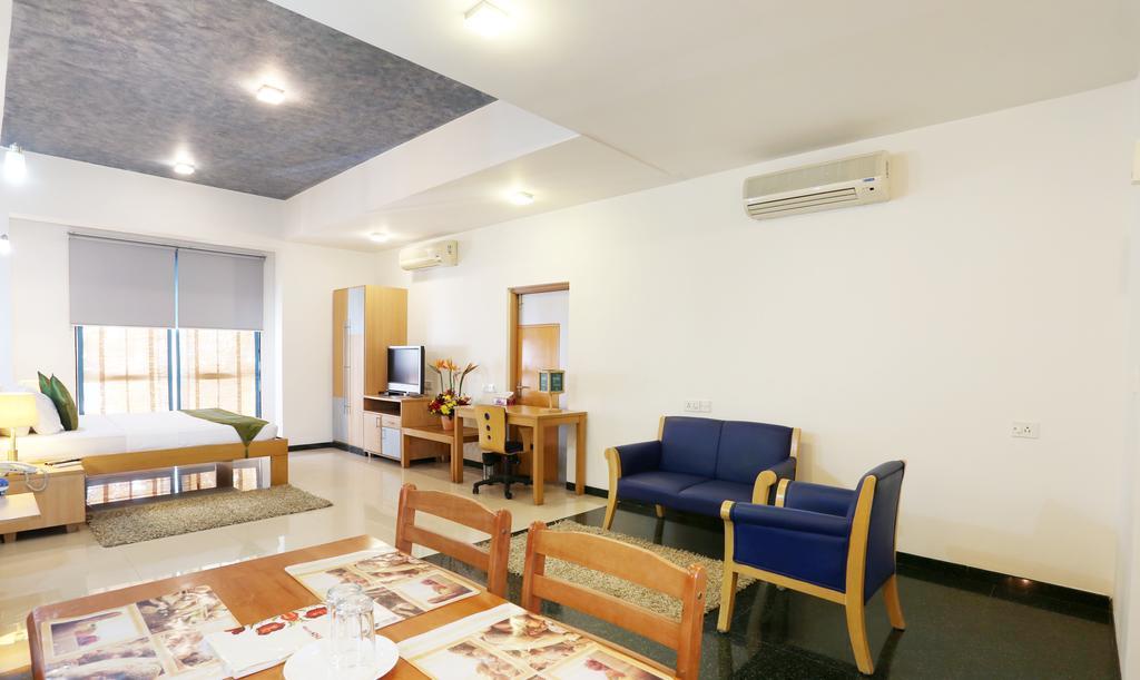 Treebo Edha Suites Koramangala Бангалор Экстерьер фото