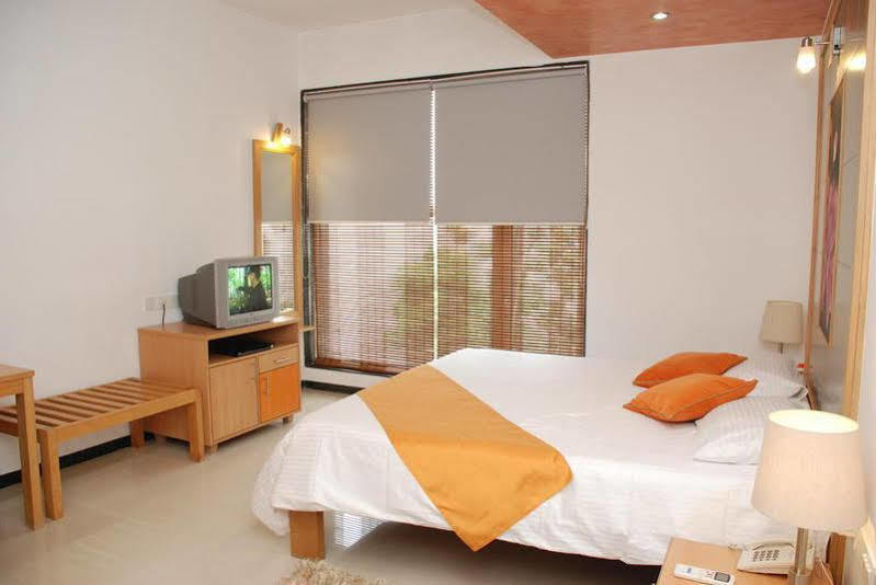 Treebo Edha Suites Koramangala Бангалор Экстерьер фото